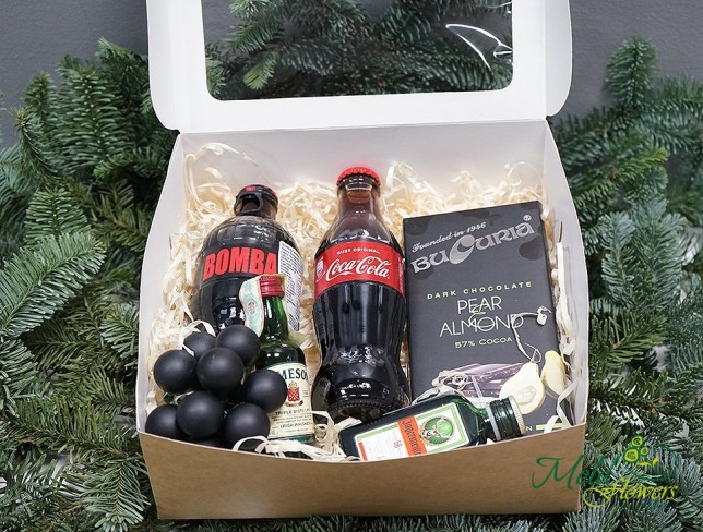Box with Coca-Cola, Jameson whiskey, and Bucuria chocolate photo